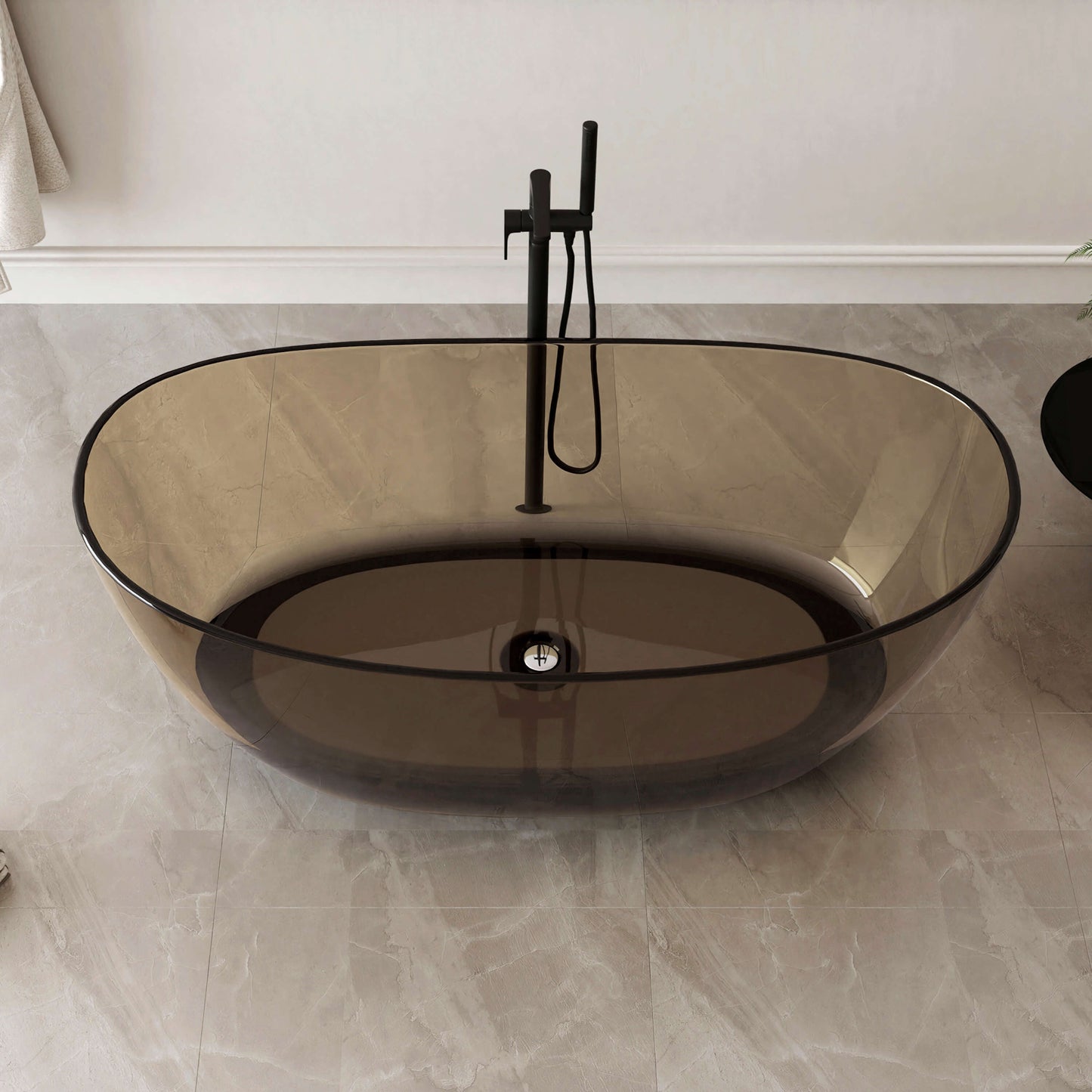 transparent bathtub with black faucet in a modern bathroom setting