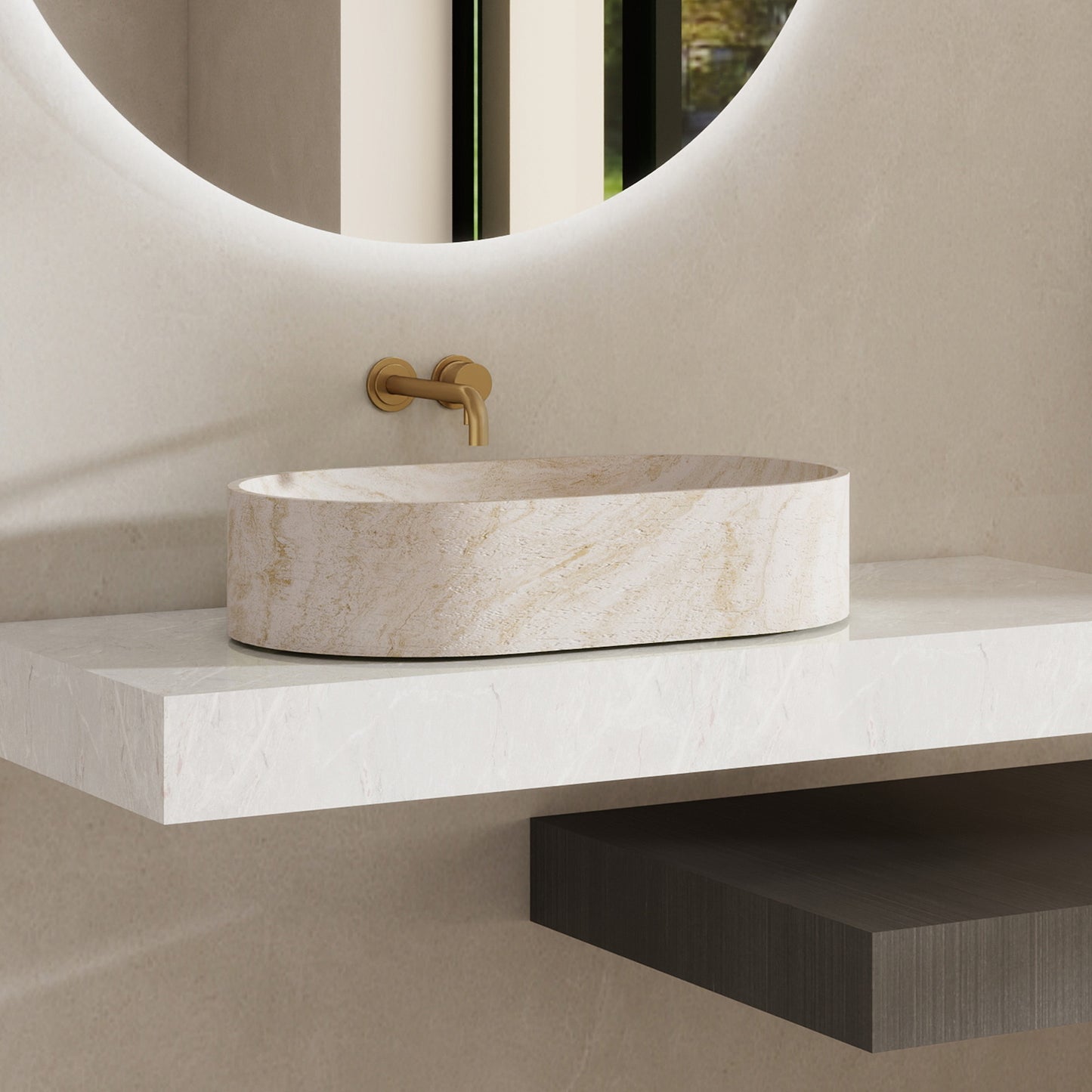 Marble pattern oval solid surface sink on a white countertop with a gold faucet.
