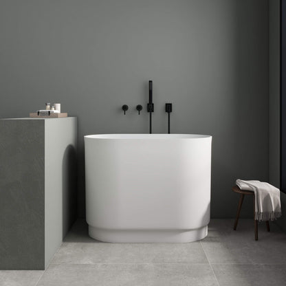 Medunjess 39'' Freestanding Tub Solid Surface Soaking Bathtub with Seat