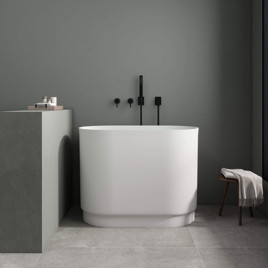Medunjess 39'' Freestanding Tub Solid Surface Soaking Bathtub with Seat