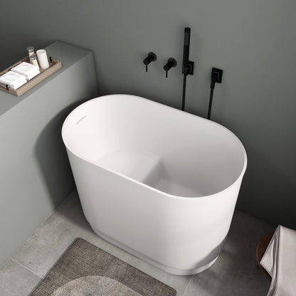Medunjess 39'' Freestanding Tub Solid Surface Soaking Bathtub with Seat