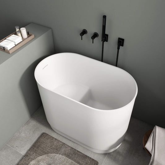 Medunjess 39'' Freestanding Tub Solid Surface Soaking Bathtub with Seat