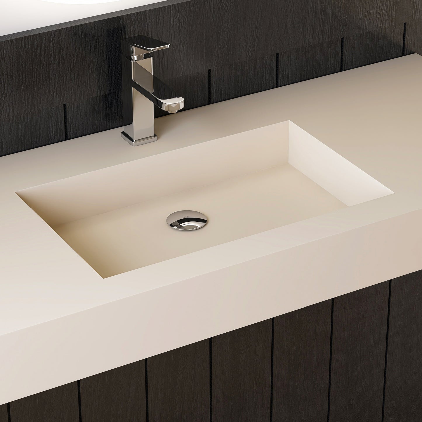 wall mounted creamy beige sink with chrome faucet in a bathroom setting