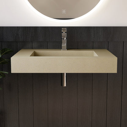 Beige wall mounted sink with metallic faucet against a dark wooden wall