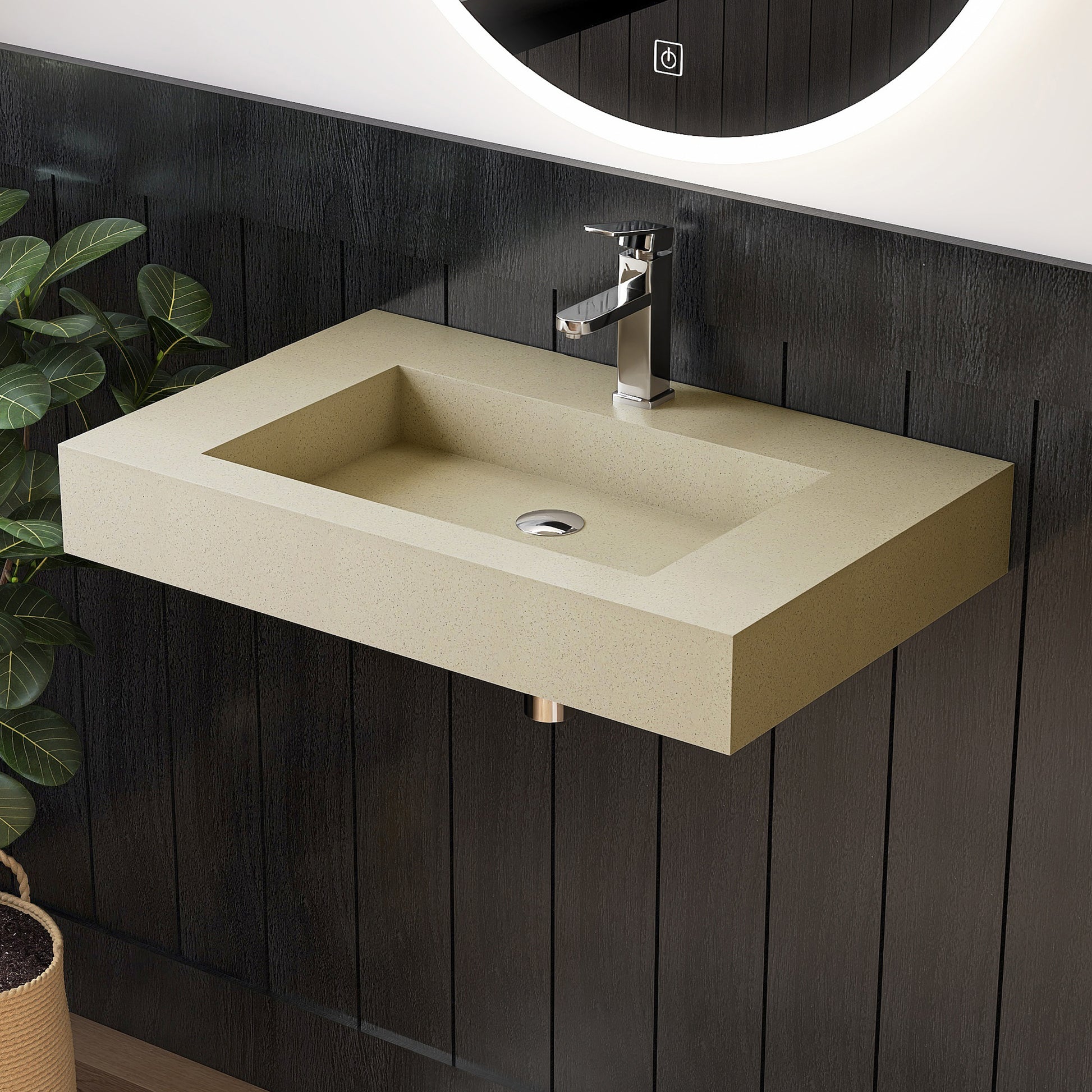 Beige wall mounted sink with silver faucet on a dark wooden wall