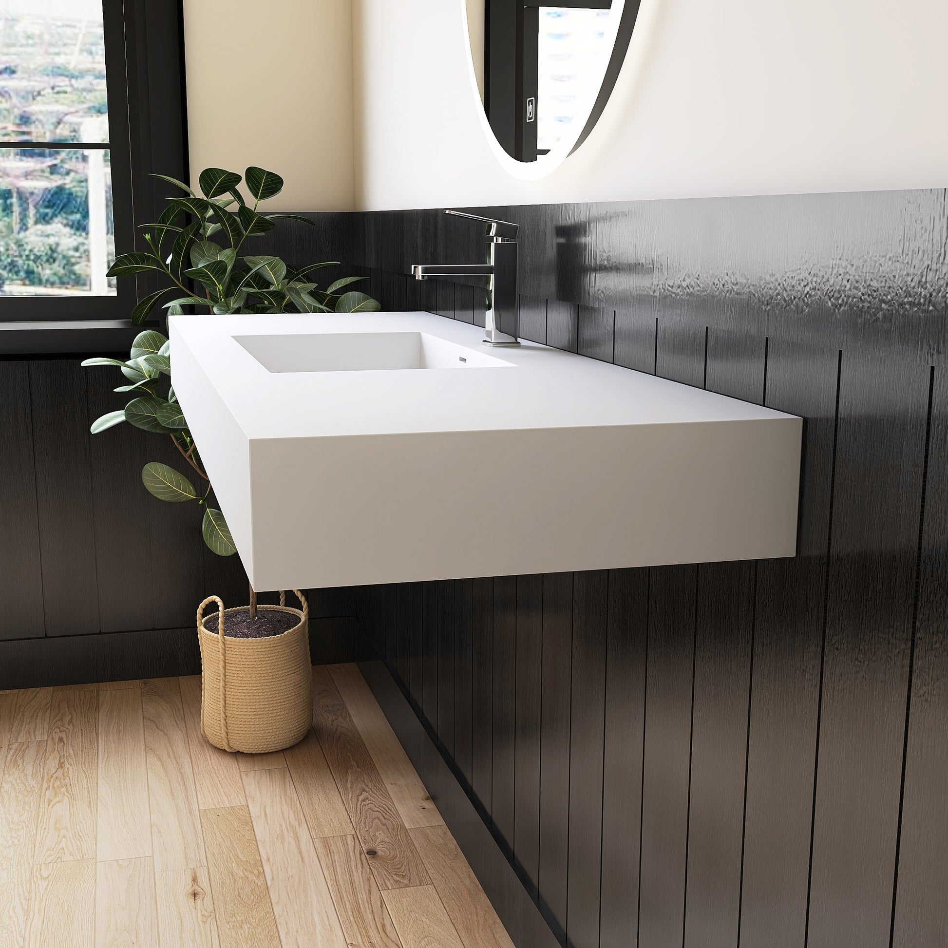 Modern bathroom with a white wall-mounted sink against a dark wooden wall.