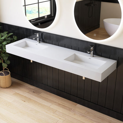 Bathroom vanity with double wall-mounted sink and mirrors on a black wall.