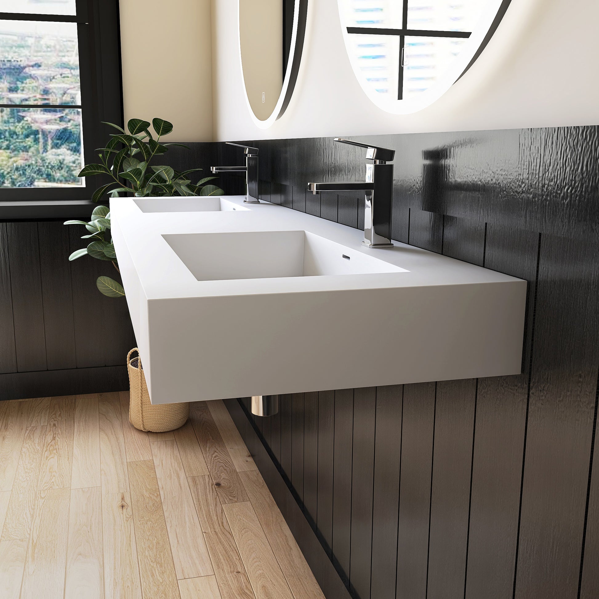Modern bathroom with a white double wall-mounted sink  against a black paneled wall.