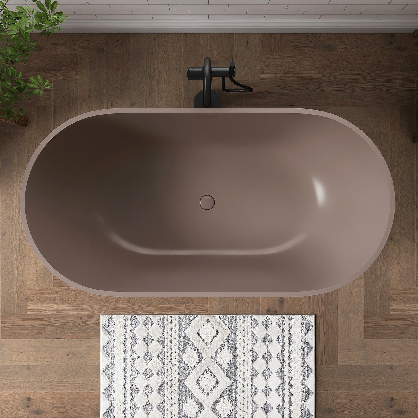 Grey-Coffee freestanding bathtub in a bathroom with wooden floor and patterned rug.