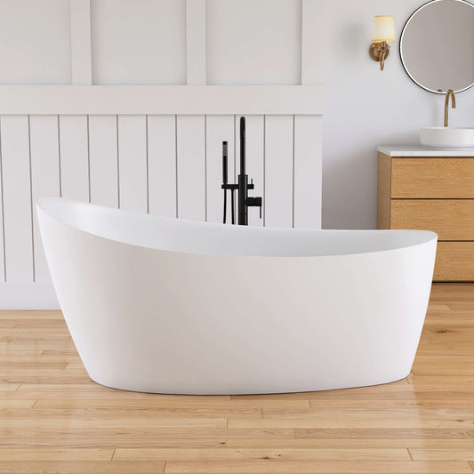 White freestanding bathtub in a modern bathroom with wooden flooring and a neutral color scheme.