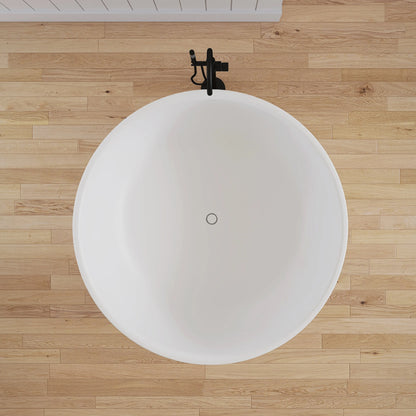 White round bathtub on a wooden floor