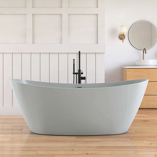 Modern freestanding bathtub in a bathroom with wooden flooring and white walls.