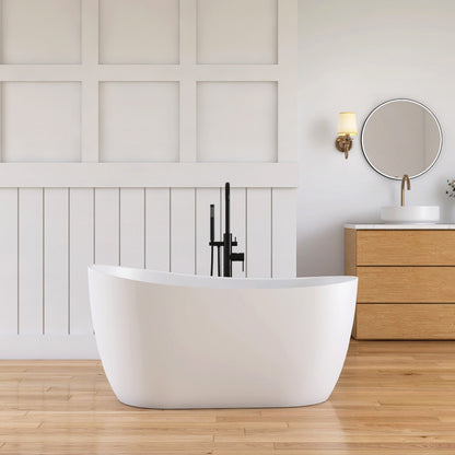 Modern bathroom with a freestanding bathtub, wooden vanity, and round mirrors.