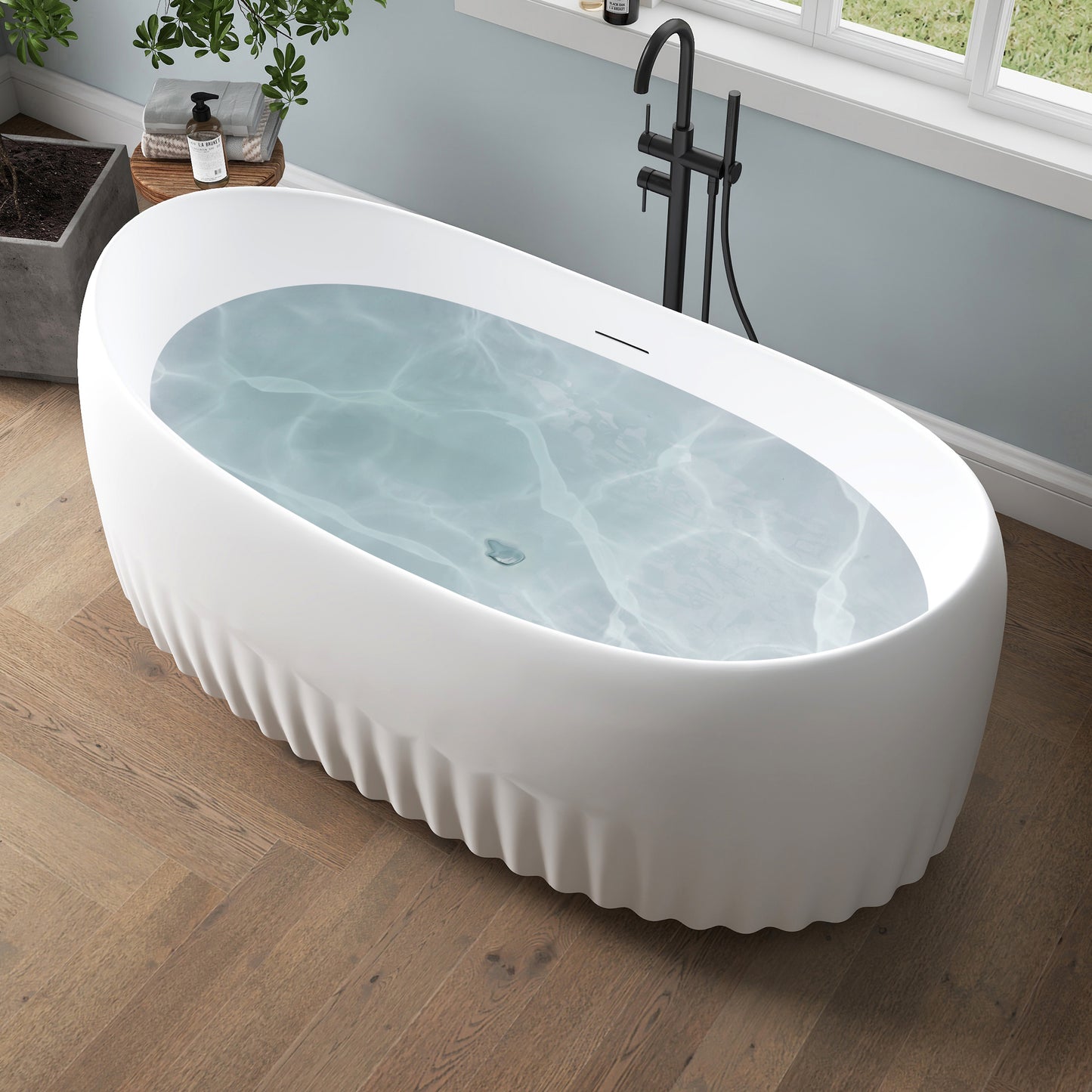 Medunjess 63" Modern Fluted Oval Freestanding Soaking Bathtub