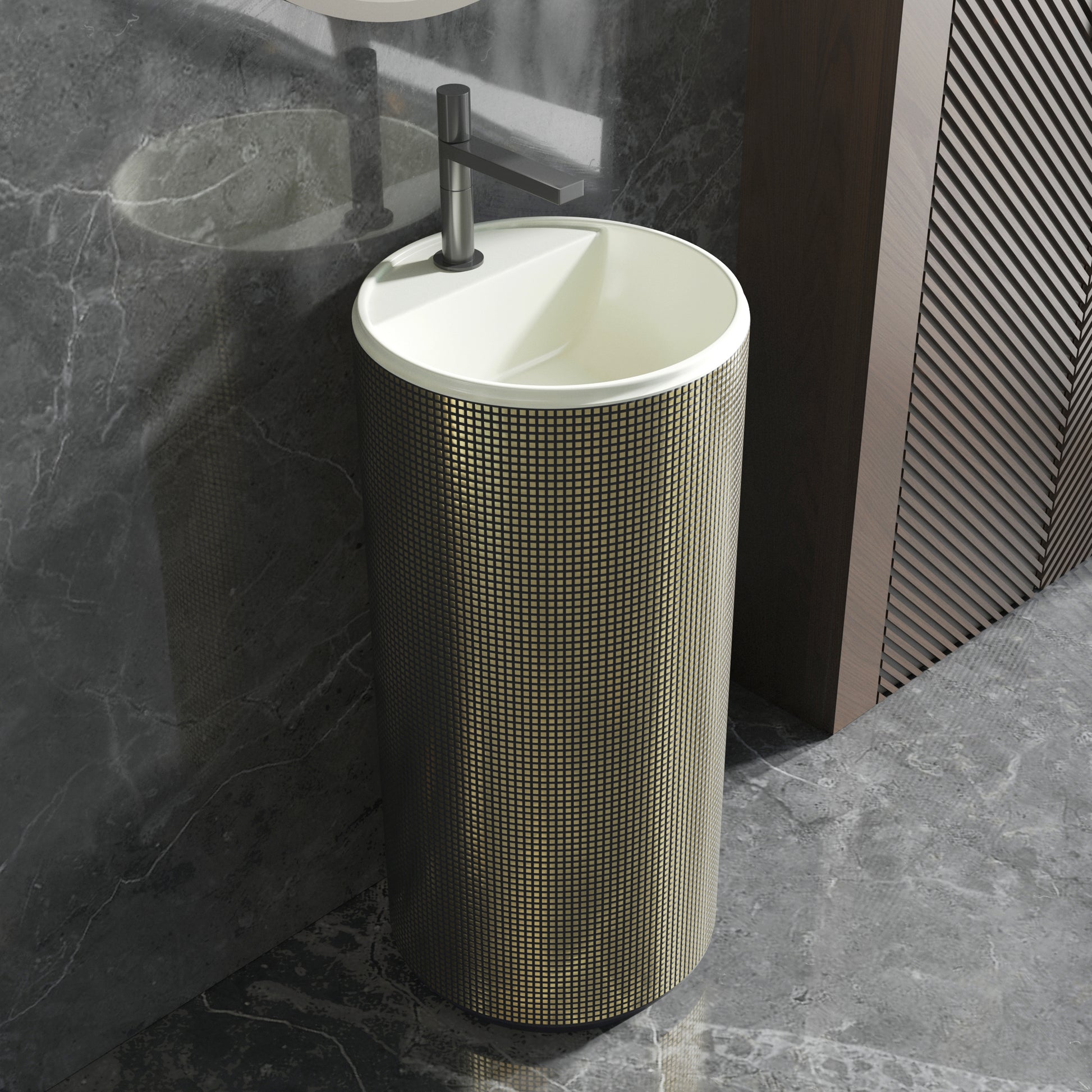 Cylindrical freestanding sink with gold mosaic pattern in a bathroom setting